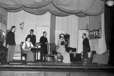 Black and white picture of theatre performers.
